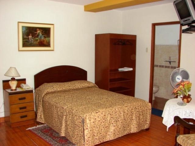 Hotel Suite Plaza トルヒーリョ 部屋 写真